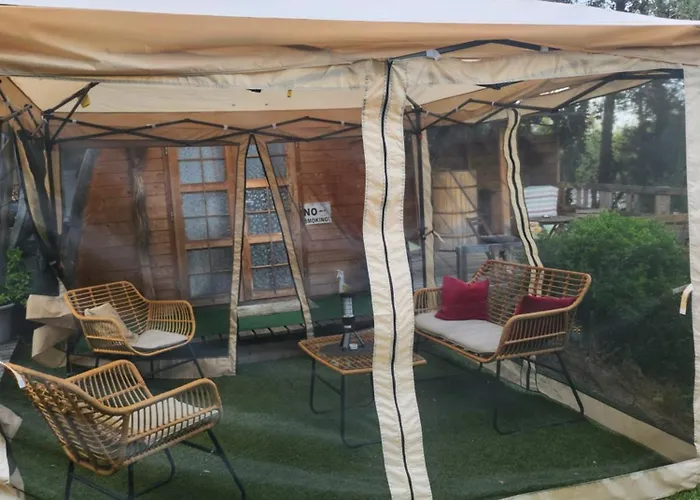 En Bois Avec Jacuzzi Prive Et Piscine مكان تخييم بورتو فيكشْيو